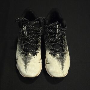 Under Armour Black and White Locked Down Kids Baseball Cleats